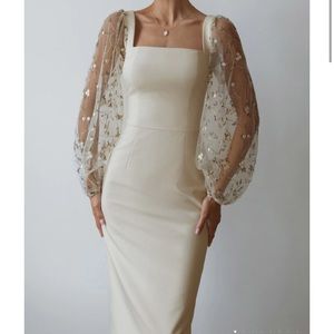 Never worn, cream Lichi dress. Mid length with transparent green & cream sleeves